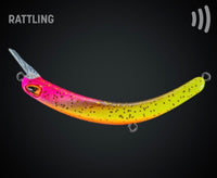 Tumbling Banana Rattling (Rasseln) Lila/Gold/Gelb